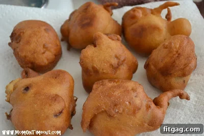 Warm cherry fritters dusted with powdered sugar