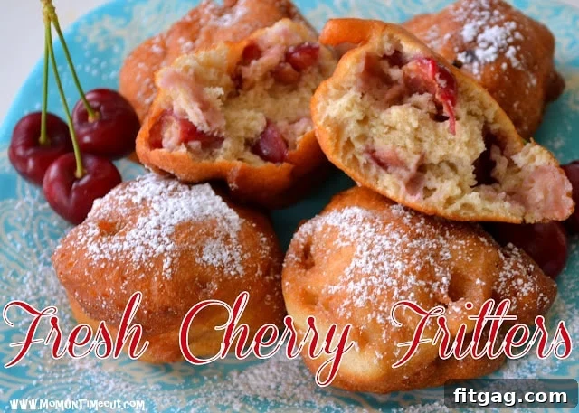 Several cherry fritters piled high, ready to be eaten