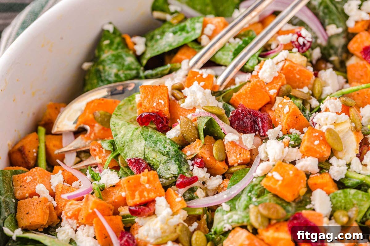 Close-up view of the sweet potato salad in a large bowl, showcasing the fresh ingredients and inviting textures.