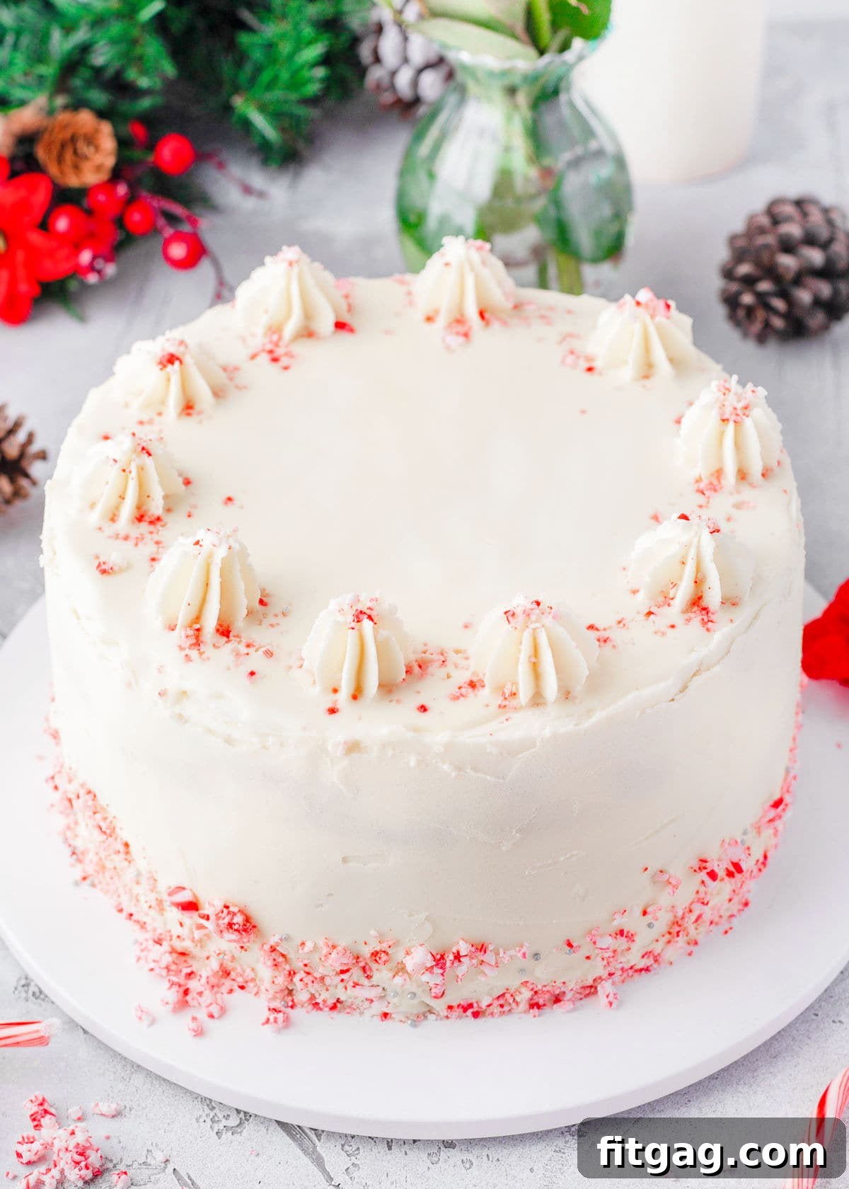 Frosted Peppermint Indulgence 7 A beautifully decorated whole Peppermint Cake, generously frosted with peppermint buttercream and adorned with a delightful sprinkle of candy canes, capturing the festive spirit.