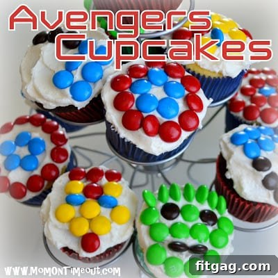Heroic Cupcakes 3 Close-up of Captain America, Iron Man, and Thor's Hammer Avengers cupcakes with M&M decorations.