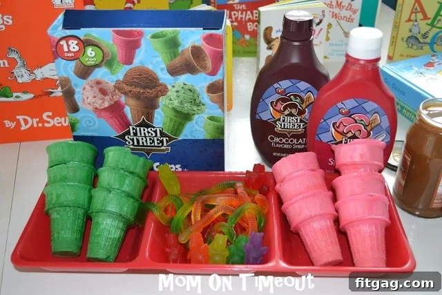 A Seuss-tastic Scoop Fest 14 Ice cream toppings bar with syrups, whipped cream, and fruit