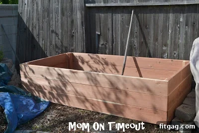 The impressive new raised garden bed now sits proudly in its leveled spot in the backyard.