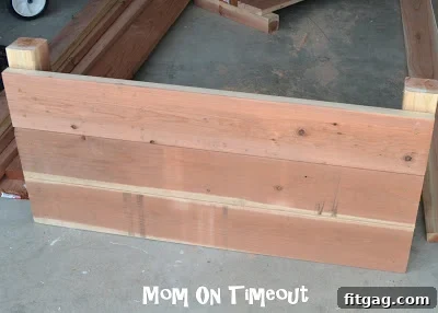 The fully assembled short end of the raised garden bed, showcasing robust construction.
