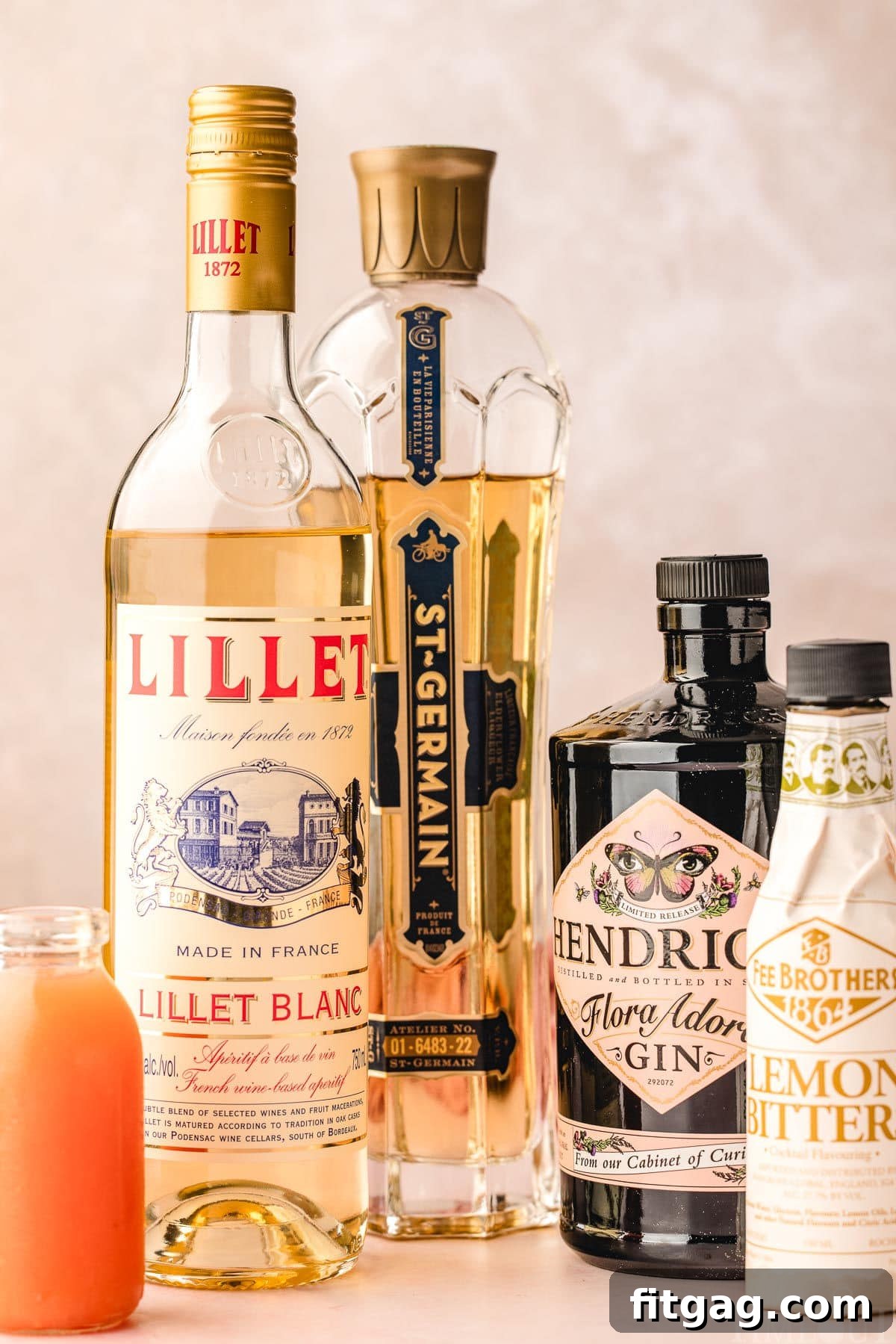 A collage of images showing all the fresh ingredients and elegant bottles required to prepare a French Blonde Cocktail, laid out neatly before mixing.