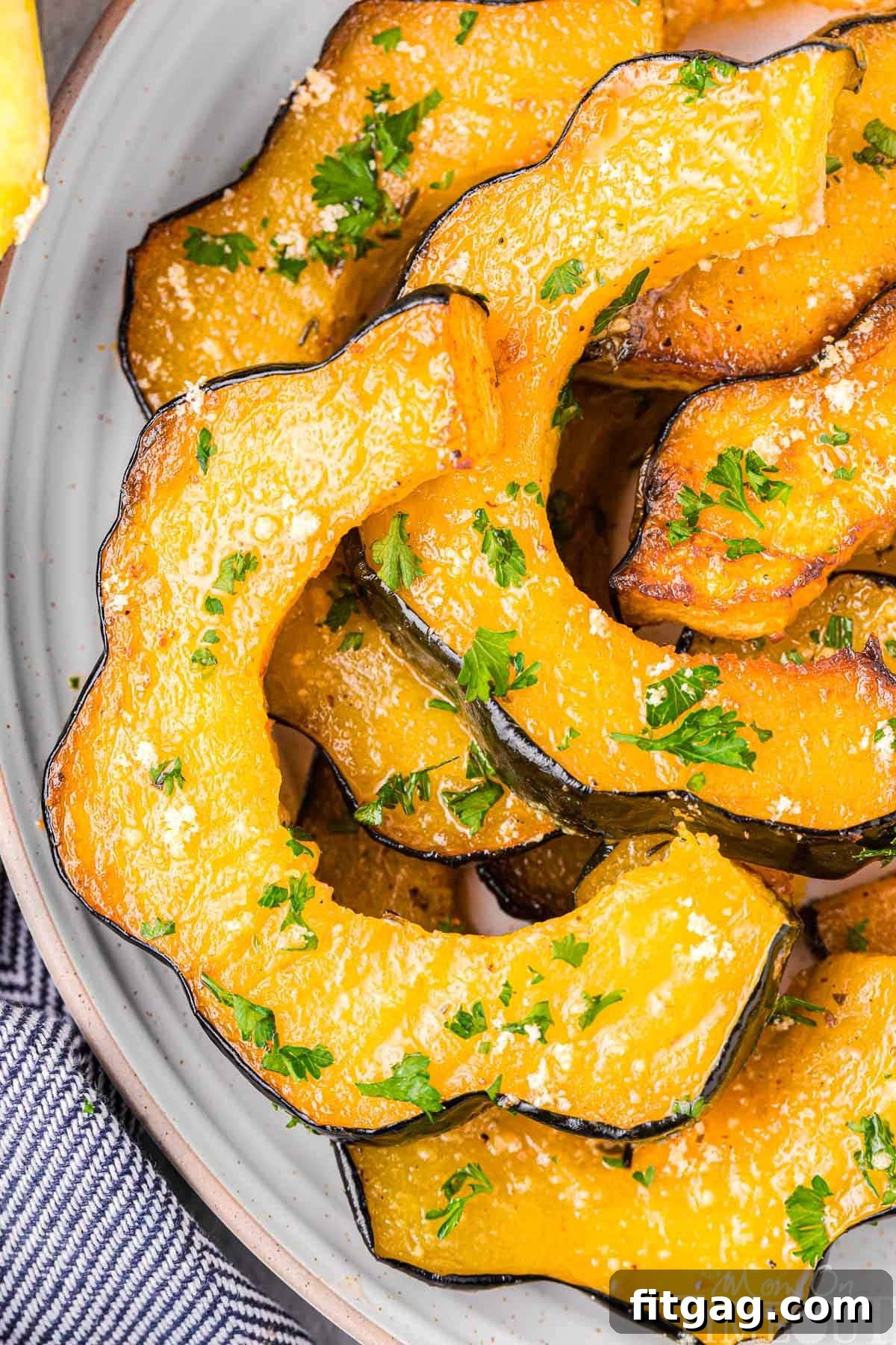 Golden Roasted Acorn Squash 4 Top down shot of slices of roasted acorn squash.