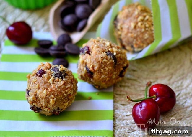 Dark Chocolate and Cherry Peanut Butter Oat Bites | MomOnTimeout.com A tray filled with freshly made Dark Chocolate and Cherry Peanut Butter Oat Bites.