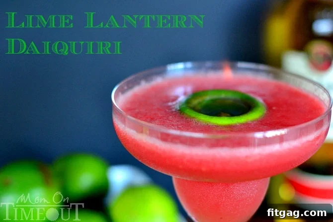 A close-up of the glowing Lime Lantern Daiquiri cocktail.
