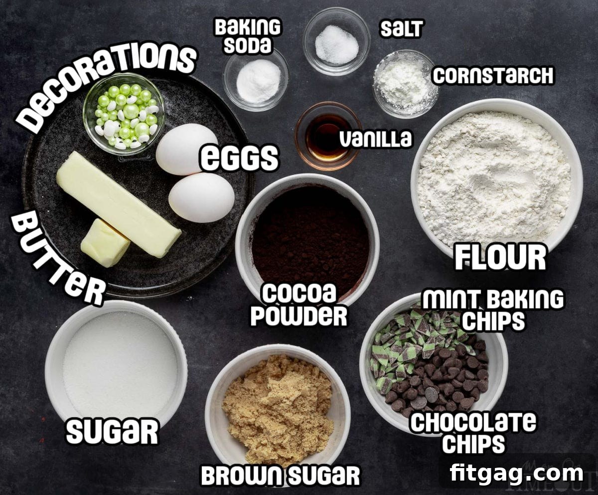 A photo that shows all of the ingredients for halloween monster cookies laid out on a dark surface.