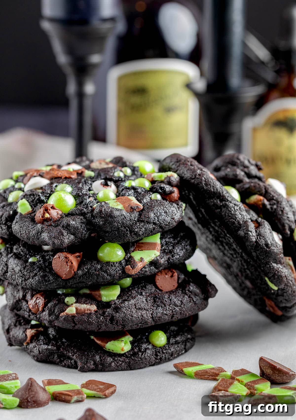 Stack of monster halloween cookies made with mint and chocolate chips. 