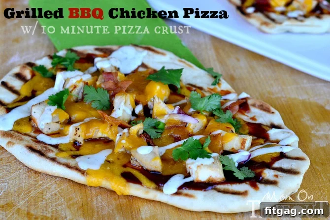 Close-up of a freshly grilled BBQ chicken pizza slice, showcasing melted cheese and toppings.