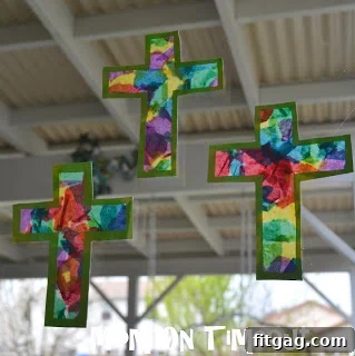 Another view of the DIY stained glass cross craft on a window