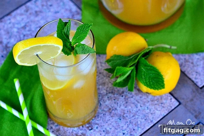 Practically Perfect Pineapple Punch with optional rum for adults, perfect for summer parties
