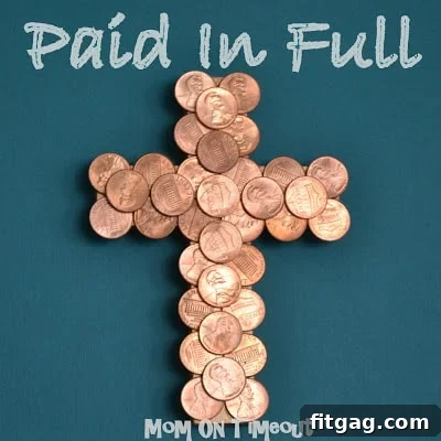 Close-up of a Coin-Covered Cross displaying the intricate detail of coins on the Easter craft.