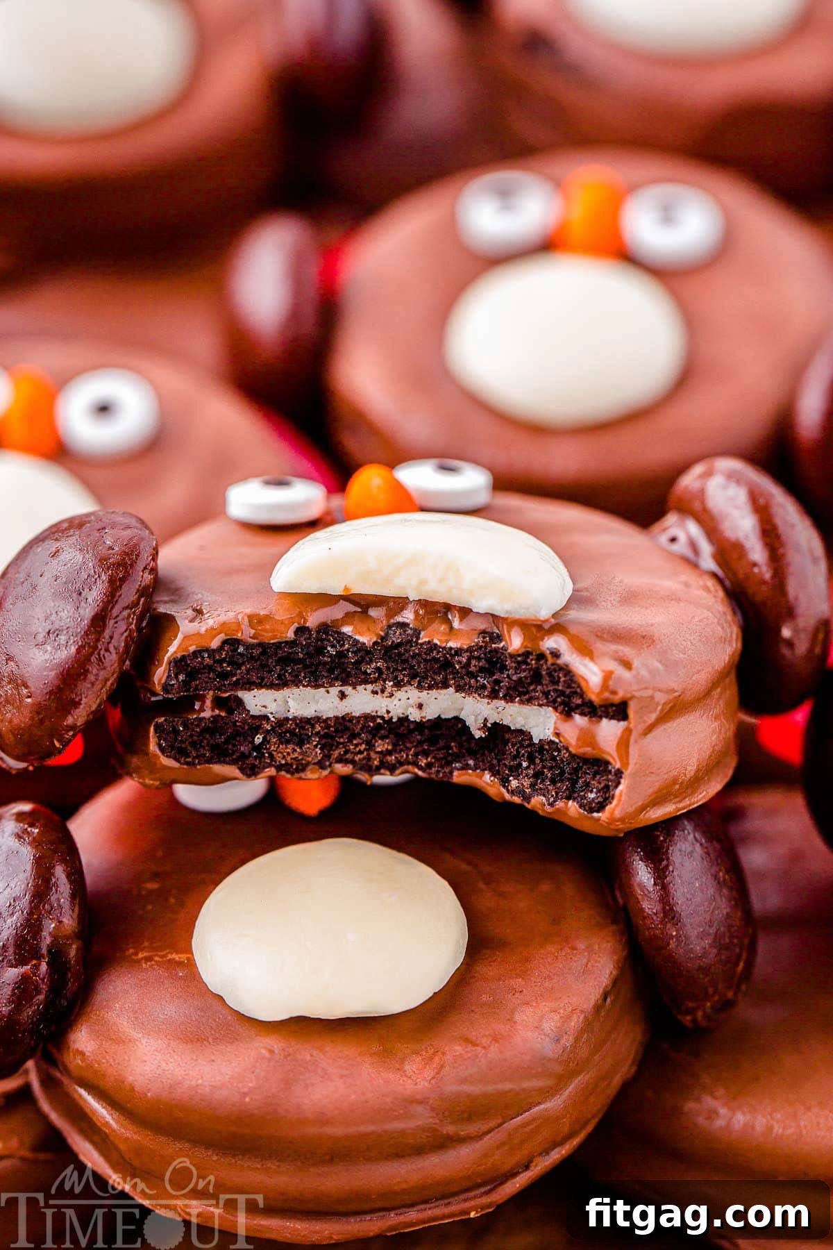 Arctic Oreo Treats 6 Shot of Oreo Penguin bitten in half so you can see the Oreo center. The cookie is sitting on more oreo penguins.