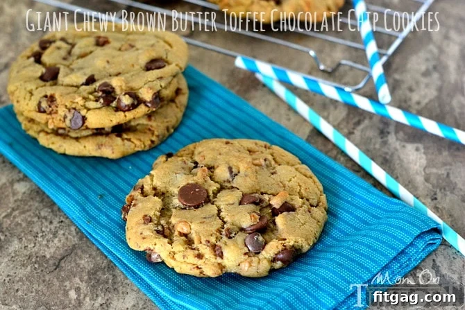 Freshly baked Giant, Chewy Brown Butter Toffee Chocolate Chip Cookies cooling on a rack