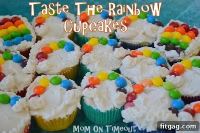 Overhead view of several rainbow cupcakes