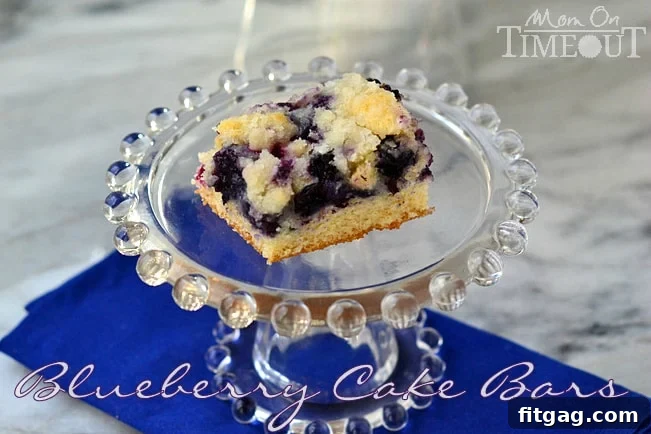 Homemade Blueberry Cake Bars served at a family brunch with fresh ingredients.