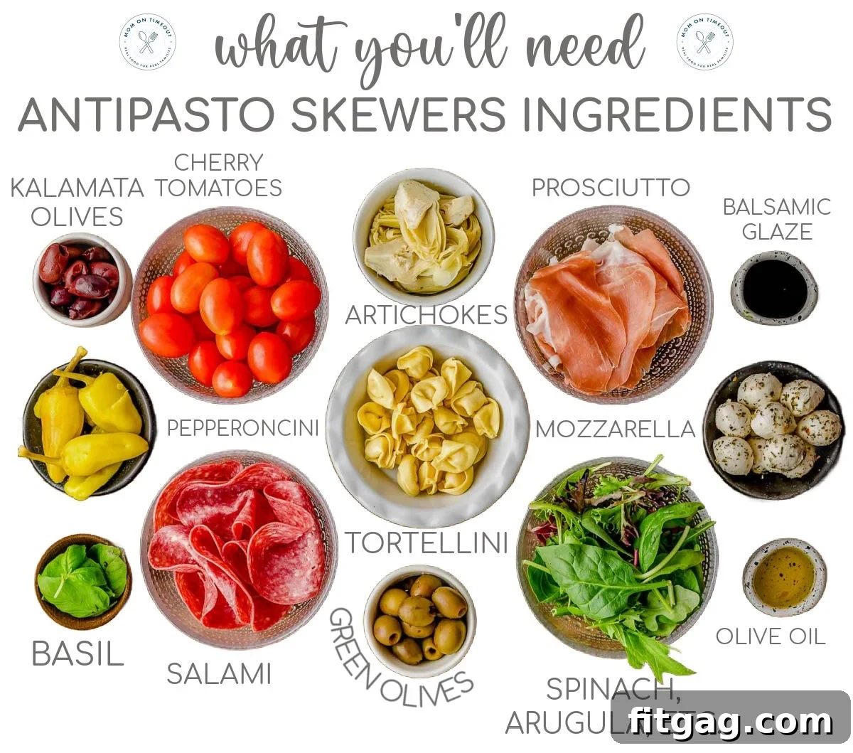 Antipasto skewer ingredients laid out in small bowls on a wooden cutting board, ready for assembly.