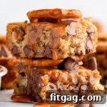 A stack of blondies with salted caramel sauce drizzled on top.
