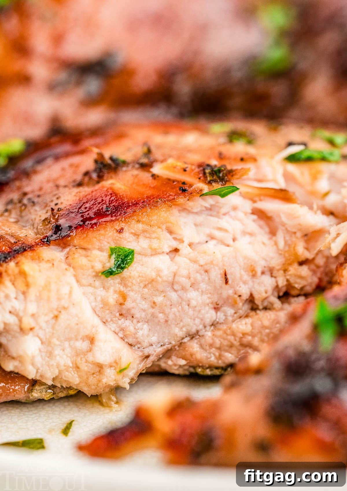Profile shot of balsamic chicken recipe cut in half.