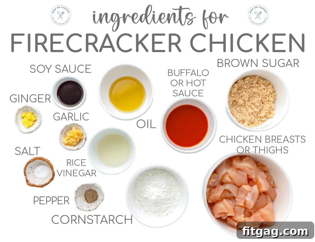 A vibrant overhead shot displaying meticulously measured ingredients for Firecracker Chicken, arranged in separate bowls on a rustic surface. A stylish text overlay adds a modern touch to the composition.
