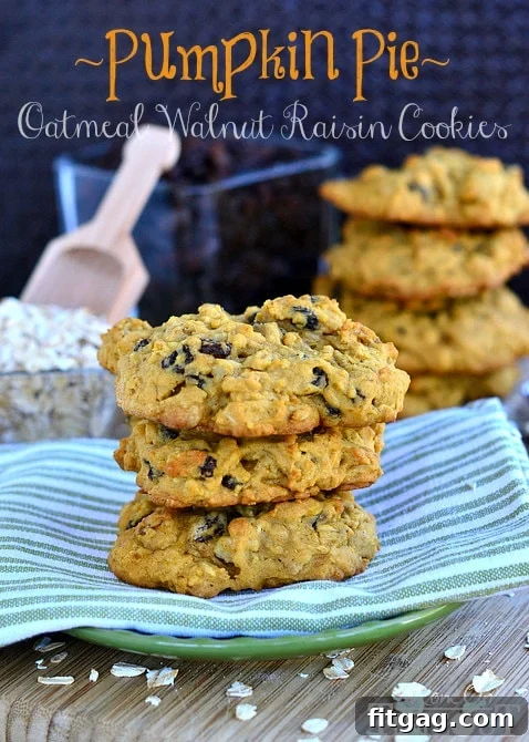 Delicious Pumpkin Pie Oatmeal Walnut Raisin Cookies, a perfect fall treat on a cooling rack