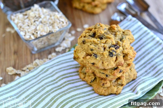 Close-up of freshly baked Pumpkin Pie Oatmeal Walnut Raisin Cookies arranged artfully