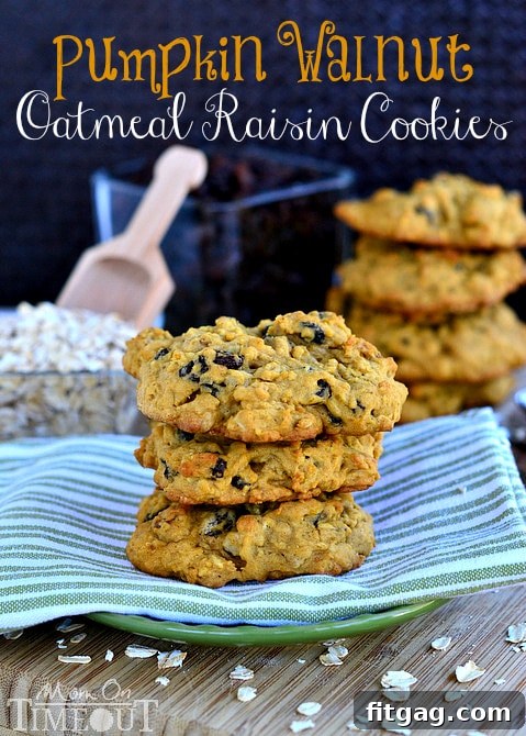 A beautifully arranged stack of Pumpkin Pie Oatmeal Walnut Raisin Cookies