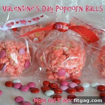 Sweet Valentine's Popcorn Balls 12 Three Valentine's Day Popcorn Balls stacked, showcasing their colorful appeal.