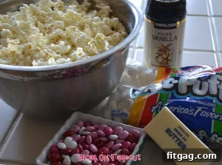 Sweet Valentine's Popcorn Balls 2 Close-up of fluffy popped popcorn ready for the marshmallow mixture.