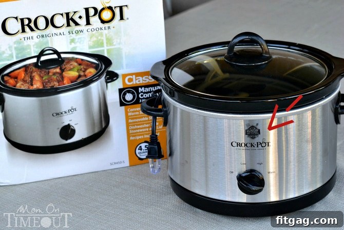 A slow cooker ready for football season, perfect for game day meals and dips.