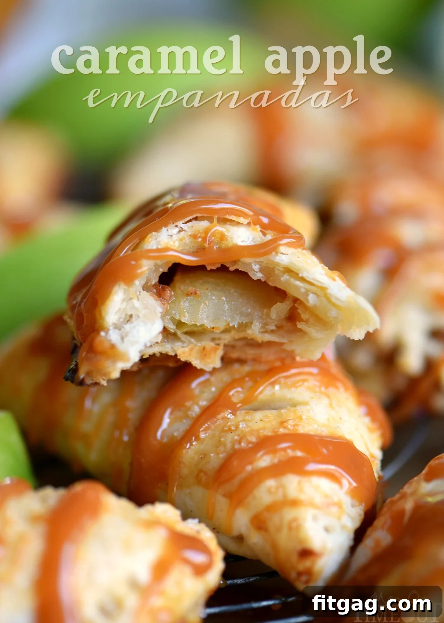 Golden brown caramel apple empanadas drizzled with extra caramel sauce, ready to be served.