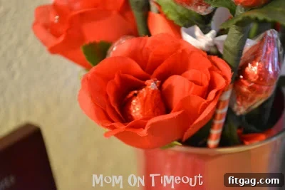 Hershey's Kiss roses mixed with real floral roses in a bouquet