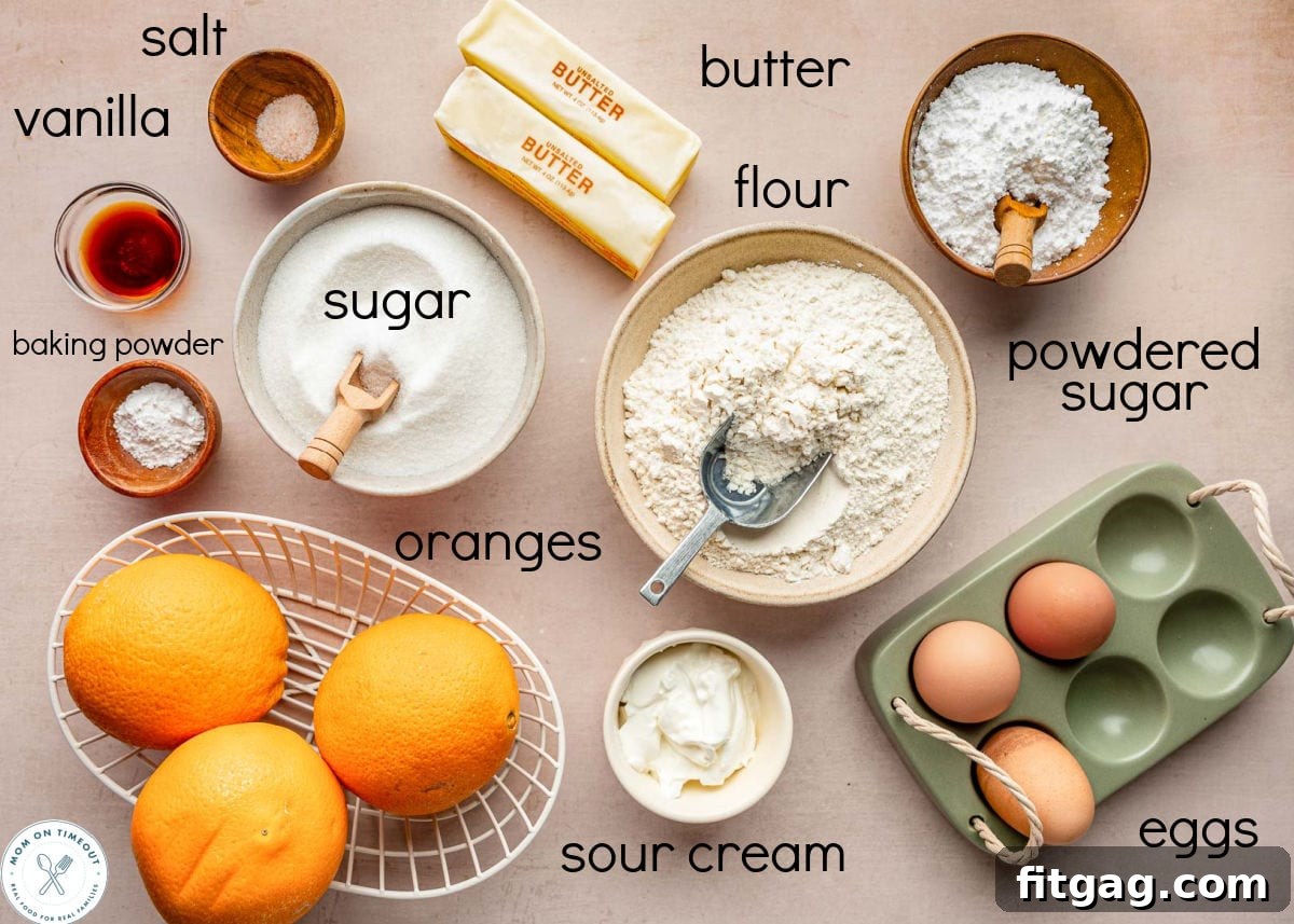Bright Orange Loaf 5 Overhead shot of orange pound cake ingredients measured out into small bowls ready to be used in the recipe.
