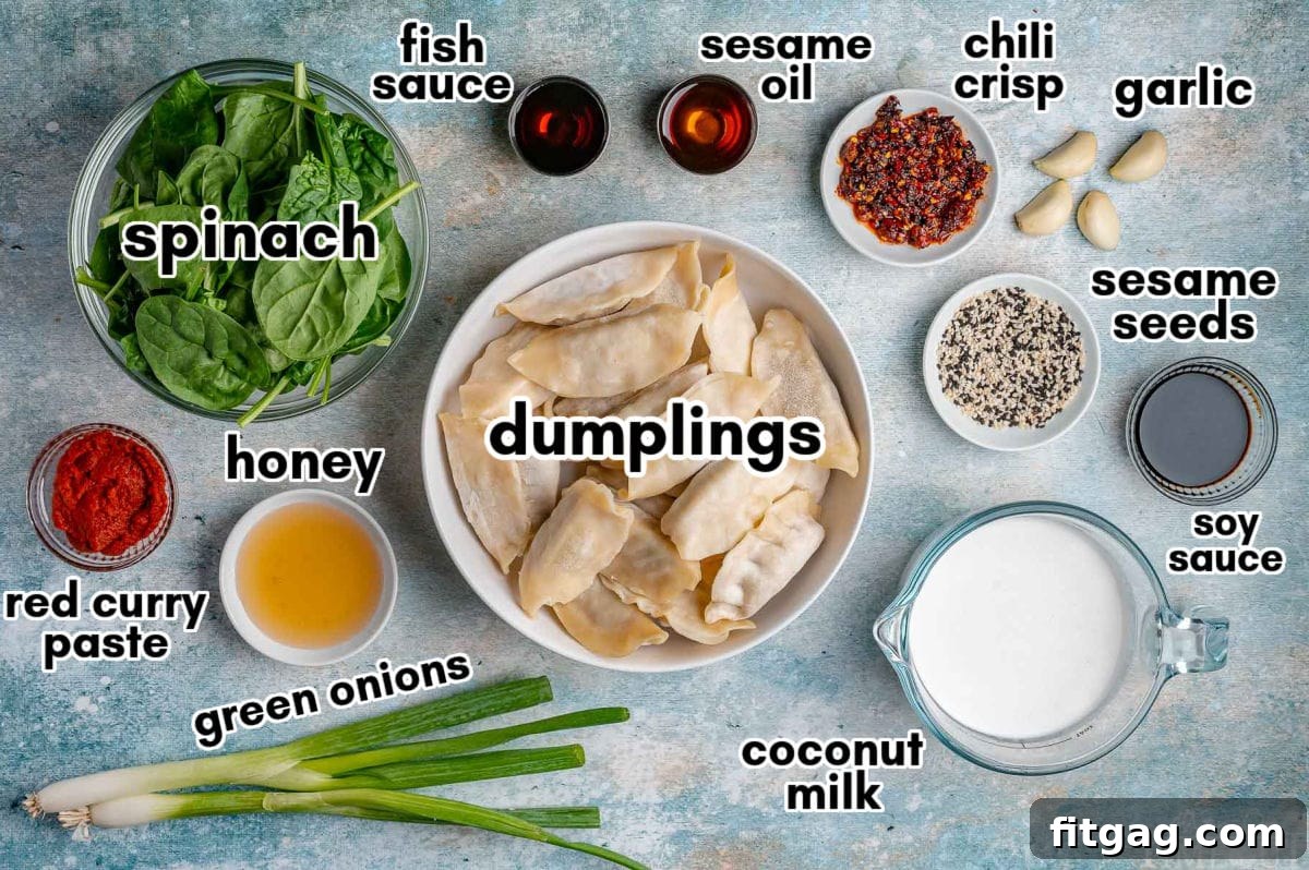 Overhead shot of all the baked dumpling ingredients carefully measured out into small white bowls and arranged on a light-colored surface, ready to be incorporated into the recipe.