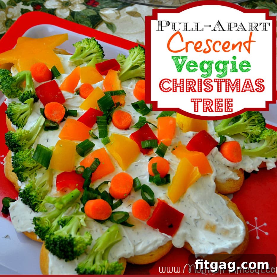 Pull-Apart Crescent Veggie Christmas Tree | MomOnTimeout.com Close-up of the fully decorated Pull-Apart Crescent Veggie Christmas Tree appetizer.
