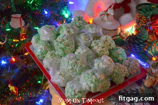 Delicious homemade colorful popcorn balls, perfect for a Christmas party.