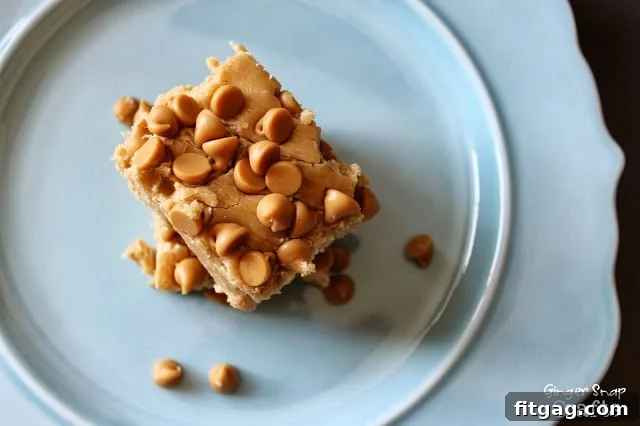 Easy Peanut Butter Fudge Recipe for Holiday Gifting Rich and creamy homemade Peanut Butter Fudge squares with peanut butter chips