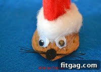 Cutting small gray felt ears for the Santa Mouse