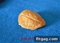 Cleaning the inside of a walnut half shell for crafting
