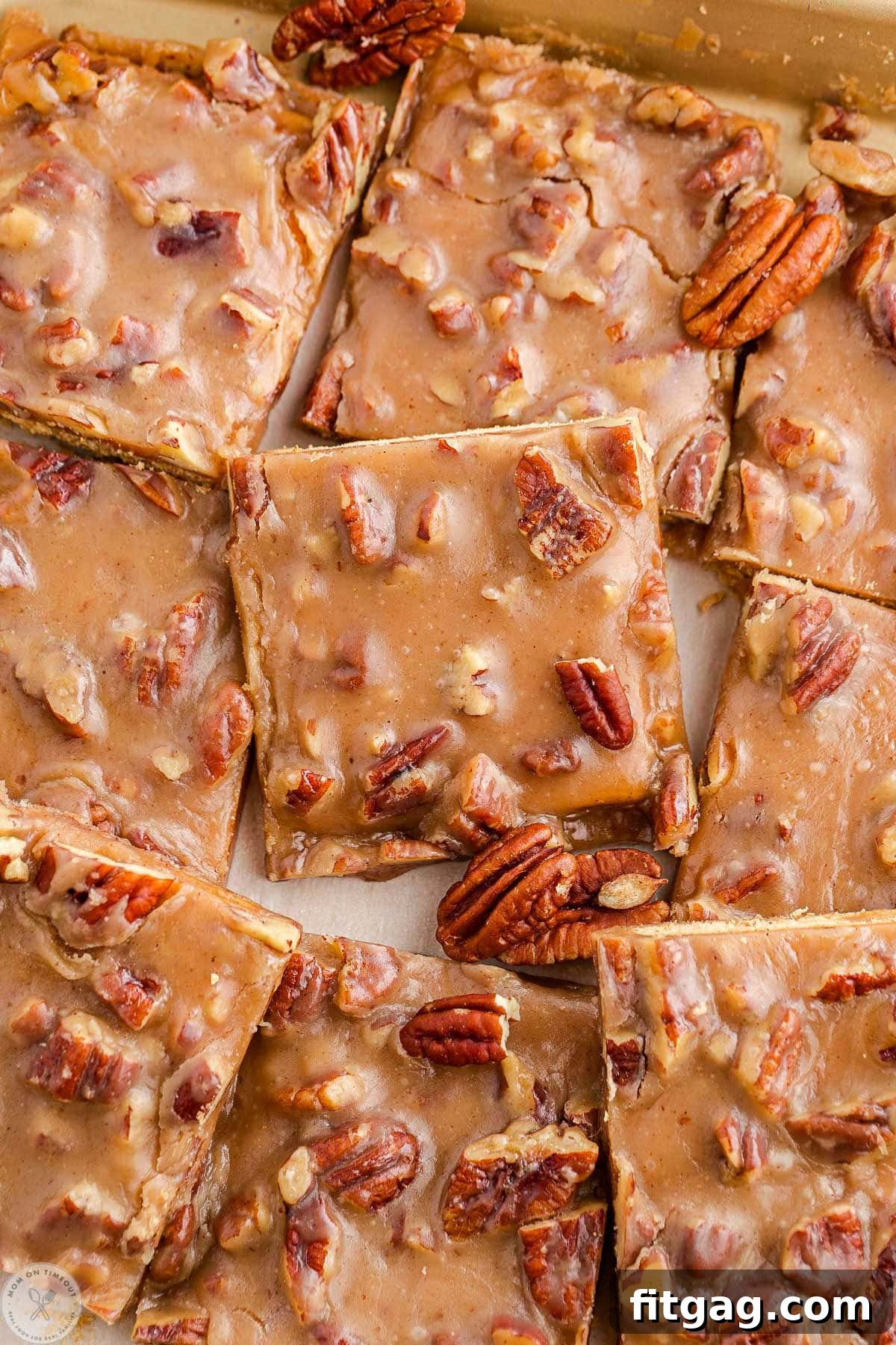 Toasted Pecan Brittle 10 Close up shot of perfectly cut pieces of pecan pie bark, arranged neatly in a sheet pan, ready to serve.