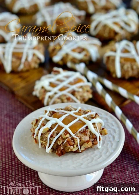 Delicious Caramel Spice Thumbprint Cookies with a white chocolate drizzle, perfect for fall and holidays.