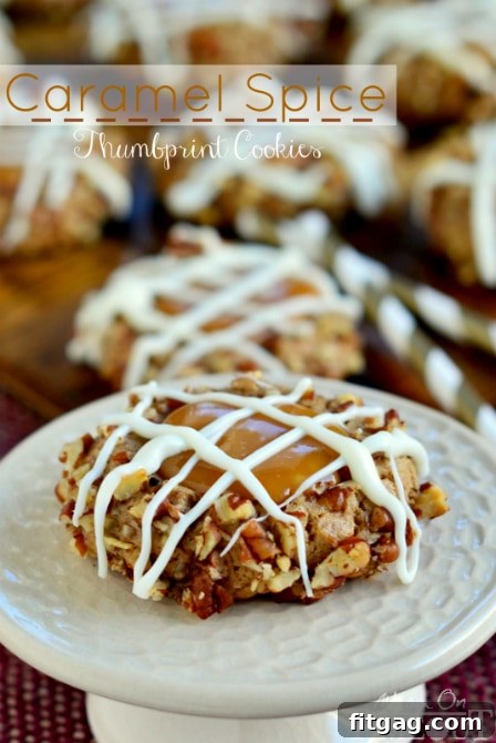 Finished Caramel Spice Thumbprint Cookies with white chocolate drizzle, ready to be enjoyed.