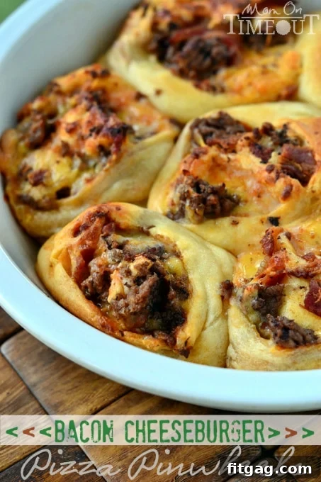 Hands preparing Bacon Cheeseburger Pizza Pinwheels, showing the crescent roll dough spread with cheese, ground beef, and bacon, ready to be rolled and cut.