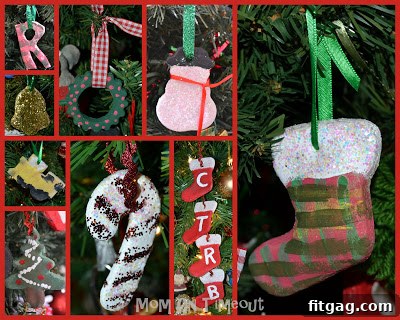 A diverse collection of handmade salt dough ornaments, including stockings, stars, and abstract shapes