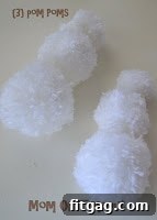 Three graduating sizes of pom-poms for a snowman