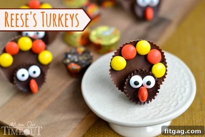 Close-up of a finished Reese's Turkey, showing the Reese's Peanut Butter Cup body, dark miniature head, candy eyes, and colorful Reese's Pieces feathers, all secured with melted chocolate. An easy and fun Thanksgiving dessert.