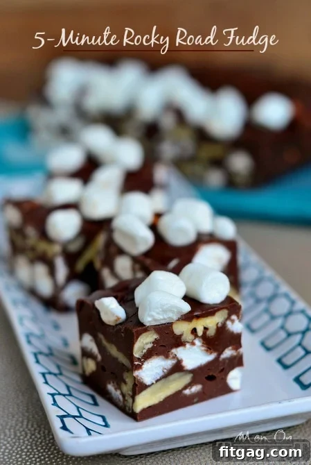 This 5 Minute Rocky Road Fudge is all about saving time! Creamy and smooth - it's everyone's favorite fudge! | MomOnTimeout.com