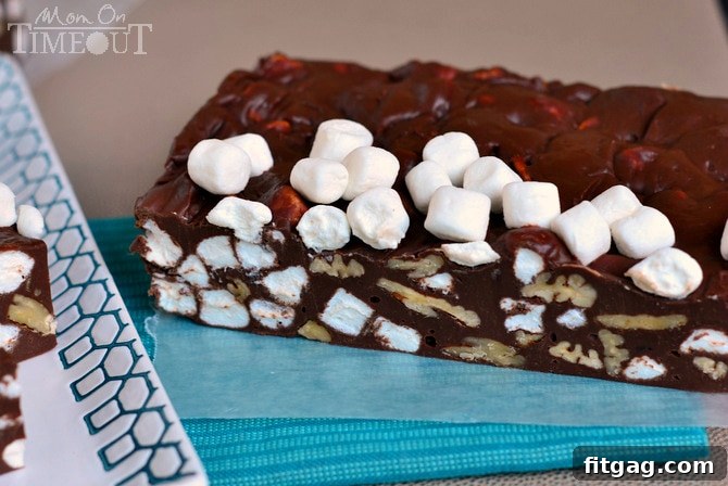This 5 Minute Rocky Road Fudge is all about saving time! Creamy and smooth - it's everyone's favorite fudge! | MomOnTimeout.com